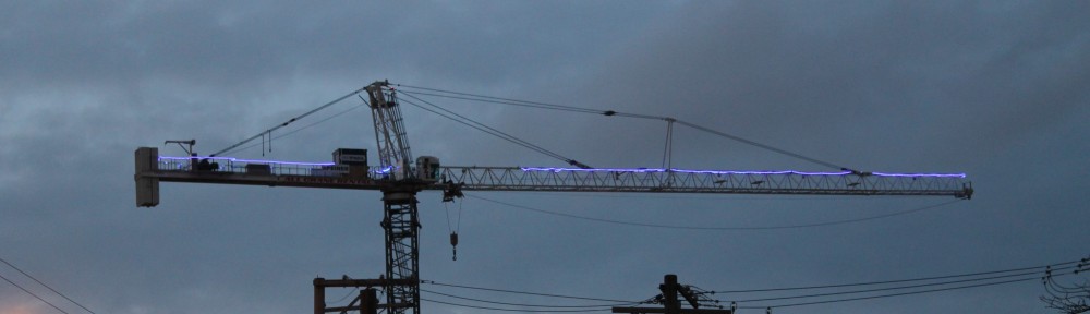 Twelve01West glowing tower crane
